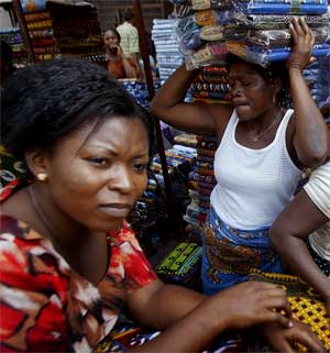 Women at a local cloth market in Lome, Togo, February 10, 2005. [© AP Images]