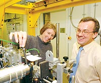 GM/CA CAT Director Janet Smith shows a beamline research station to Murray Gibson, associate laboratory director for Scientific User Facilities.
