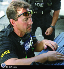 law enforcement agent using computer