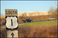 Photo of Route 1 sign with cars in the background