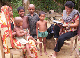 A public health worker collects data on diarrhea and respiratory disease in the Bandarban region of Bangladesh