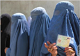 Burka-clad women in line (AP Image)