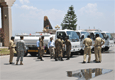 Islamabad, June 20, 2009 - Brigadier Omar Hayat of the Pakistani Army accepts delivery of six water trucks provided by the U.S. government.