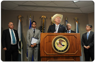 Secretary Salazar with a team from the Department of Justice and the FBI announce the indictments of 23 antiquity thieves.  Left to right are Utah FBI Field Office Special Agent in Charge Timothy Fuhrman, U.S. Attorney in Utah, Brett Tolman, Secretary Salazar, Interior Assistant Secretary-Indian Affairs, Larry Echo Hawk and Deputy Attorney General David W. Ogden.