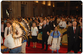 Secretary Salazar, Assistant Secretary EchoHawk and other members of the secretary's staff participate in a Friendship Dance with members of the Shashone-Bannock Tribe. (Photo credit: Tami A. Heilemann - DOI)