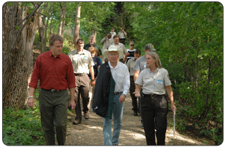 Assistant Secretary Tom Strickland, Secretary Salazar and refuge biologist Jeanne Holler tour the Minnesota Valley National Wildlife Refuge. (photo credit: Tami A. Heilemann - DOI)