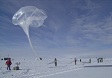 The launch of a balloon with an instrument capable of detecting terrestrial x-rays in the upper atmosphere.