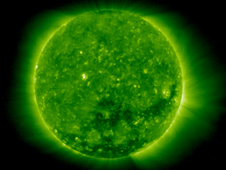 A coronal hole, the dark spot beginning just below the sun's center and extending to the right, is shown opening up in this image by NASA satellite STEREO.
