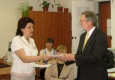 Irina Akhyamova, Professor Assistant   greets Consul General Tim Sandusky