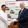 Mr. Robert J. Wilson, Mission Director, USAID/Pakistan is handing over the transfer agreement to Dr. Sohail Altaf, Secretary Health NWFP.