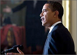 Photo of President Barack Obama standing at a podium.