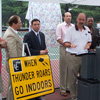 James E. Lee speaks at a local press event.