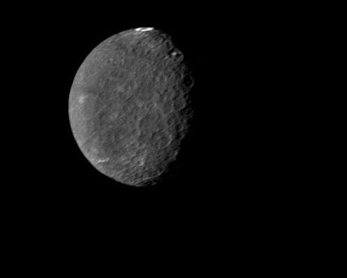 Image of heavily-cratered moon Umbriel.