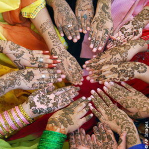 Decorated hands in a circle (AP Images)