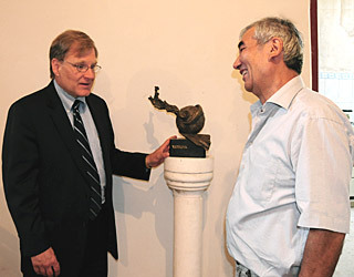 Sculptor Rashit Suleymanov presented U.S. Ambassador Richard Norland with a sculpture he made in memory of the lives lost when Hurricane Katrina hit the city of New Orleans in August, 2005