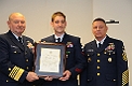 ADM Allen and Master Chief Bowen congratulate AMT2 Stephen 