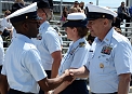 Master Chief Petty Officer Skip Bowen congratulates Seaman John Holden today during the recruit graduation of Kilo 181 here at Coast Guard Training Center Cape May, N.J.