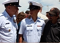 Master Chief Petty Officer Skip Bowen talks with Seaman Robert Maynard and his father today at the graduation ceremony for Kilo 181 here at Coast Guard Training Center Cape May, N.J.