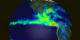 A rotating globe showing the monthly average rainmap for September 1998 as measured by TRMM.  High rainfall rates are in red.