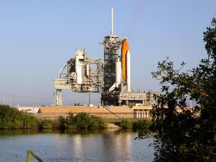 Space Shuttle Discovery sits on Launch Pad 39A after rollback of the rotating service structure, or RSS. Discovery's scheduled launch on mission STS-128 mission to the International Space Station was scrubbed again Tuesday due to a liquid hydrogen valve malfunction.
