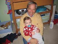 Mr. Coy with his Grandchild