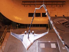 A BWB scale model in a wind tunnel.
