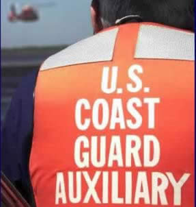 US Coast Guard Auxiliarist watching  USCG helicopter operations