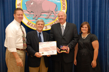 Gary Reimer is presented with Take Pride in America Award