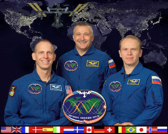 ISS015-S-002C --- Fyodor Yurchikhin (center), Oleg Kotov (right) and Clayton Anderson