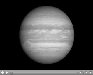  Click here for movie of PIA09235 On Approach: Jupiter and Io