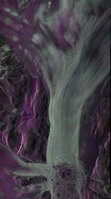 L-band polarmetric image of the Kangerlugssuaq ice fjord, centered at 68 degrees 38 minutes North, 33 degrees 03 minutes West. This false color 17 x 30 km SAR image is a composite of three polarizations with HH polarization colored red, HV colored green, and VV colored blue.