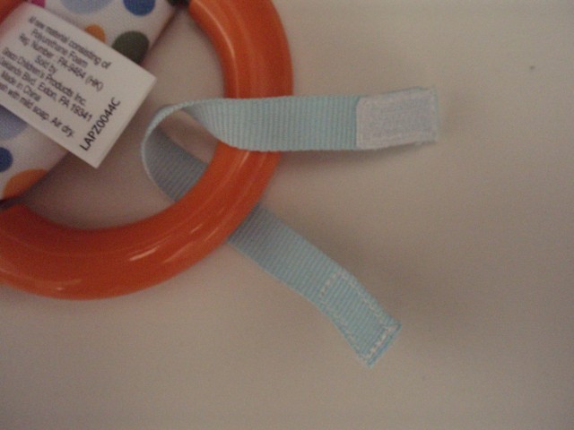 Picture of Recalled Detachable Toy on Doorway Jumper