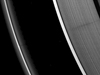A vertically extended structure or object in Saturn's F ring casts a shadow long enough to reach the A ring in this Cassini image
