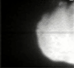 This movie was  taken by Deep Impact's flyby spacecraft shows the flash that occurred when comet Tempel 1 ran over the spacecraft's probe. It was taken by the flyby craft's medium-resolution camera.