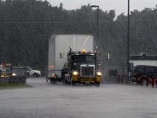 The truck carrying the SDO satellite arrived during a summertime thunderstorm's downpour.