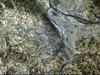 Starting with a view of the Portland, Oregon, vicinity, we push in to the southern section, viewing a town called Oregon City. Red dots appear showing the areas where growth has occurred between 1986 and 1996.