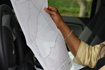 Enumerator reviewing a map