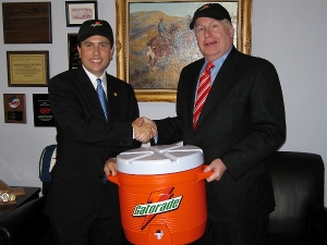 Congressman Boren and Galen Reser (Vice President of Government Relations for Pepsico), holding coller of Gatorade