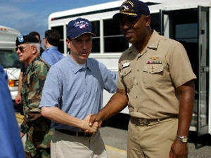 Congressman Boren shaking hands with U.S. soldier stationed at Guantanamo Bay, Cuba.