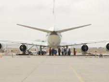 Test instrumentation is set up behind the inboard engines of NASA’s DC-8.