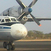 An airplane stops at a remote airport.