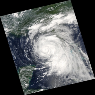July 9, 2005 18:45 (UTC)
After crossing Cuba, Dennis regained strength into a dangerous Category 3 hurricane with winds approaching 185 kilometers per hour (115 mph) when this image was taken.
