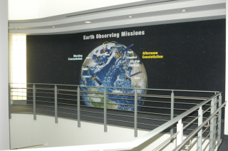 A photograph of the completed wall mural.