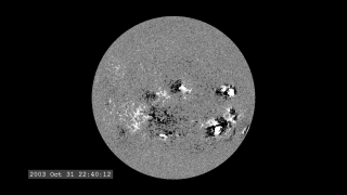 This movie displays nearly two weeks of MDI magnetogram data from around Halloween 2003.