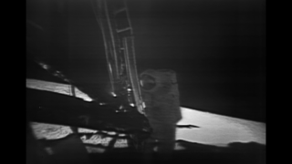 Partially restored video of Buzz Aldrin follows Neil Armstrong down the lunar module ladder. 