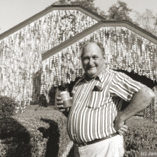 John Milkovisch in front of his Beer Can House, photo copyright Janice Rubin, from http://www.beercanhouse.org/