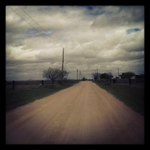A dirt road near San Benito, Freddy Fender's hometown. There's a water tower there with a portrait of him.  Hidalgo County.