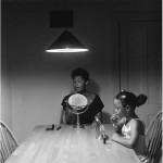 Carrie Mae Weems, "Untitled (Woman and daughter with makeup)" from "Untitled (Kitchen Table Series)," 1990. Silver print, 27 1/4 x 27 1/4 inches. Courtesy the artist and Jack Shainman Gallery, New York.