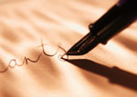 Photo of a fountain pen writing.