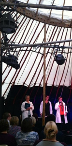 Clare, Pam, and Susan on stage in the yurt